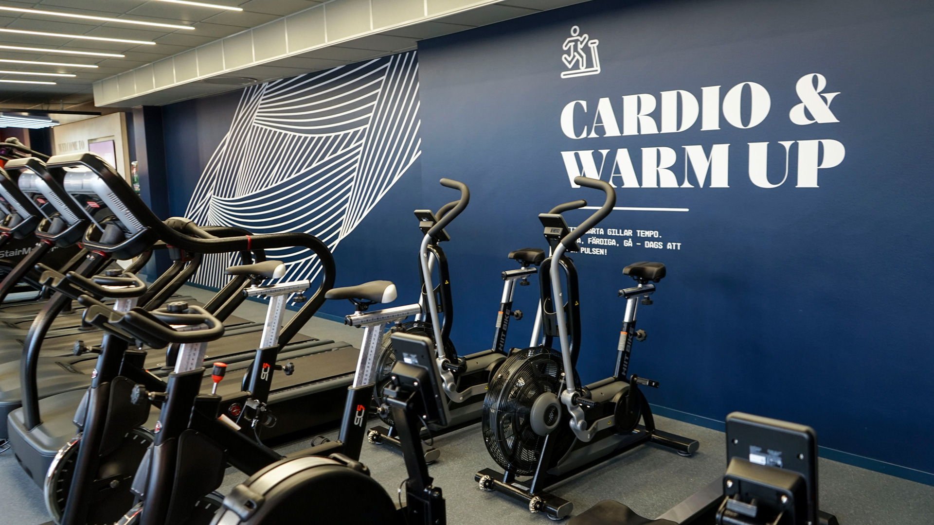 The cardio and warmup area at Fitness24Seven